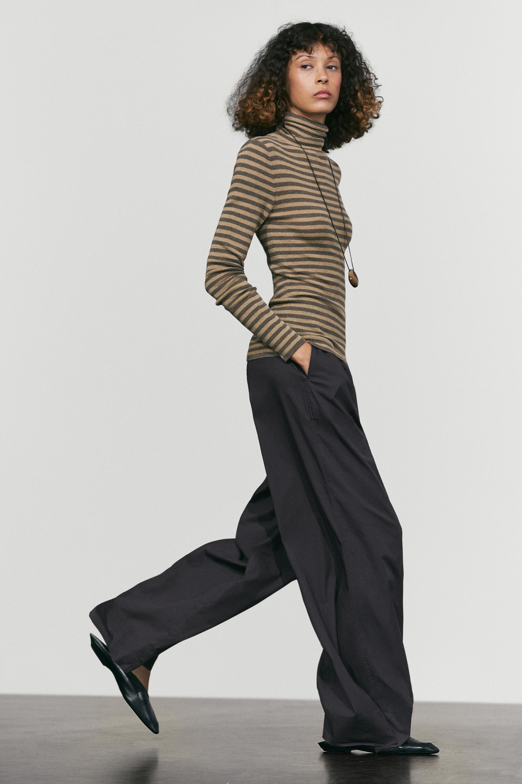 Striped turtleneck knit sweater